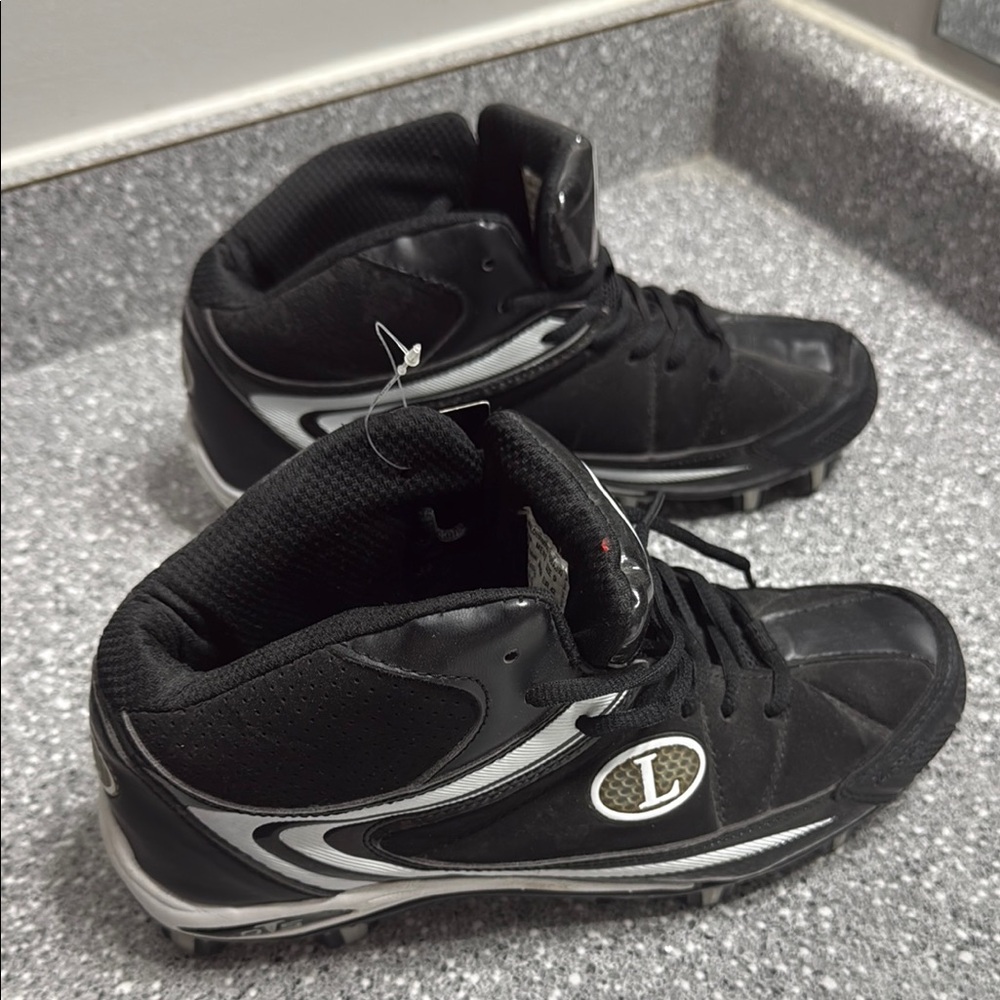 Black and White Athletic Shoes with Cleated Soles